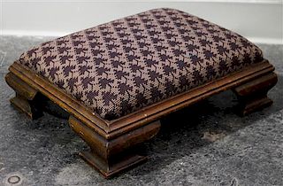 An Empire Style Foot Stool Height 4 1/2 x width 16 x depth 12 3/4 inches.