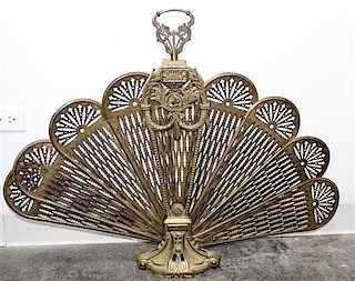 A Victorian Brass Fan Form Fire Screen Height 27 inches.