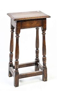 * A Jacobean Style Oak Stool Height 28 1/2 inches.