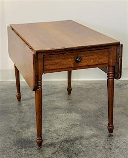 An American Walnut Drop Leaf Table Height 20 x width 32 1/2 x depth 28 inches (open).