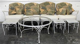 A Woodard Enameled Patio Set Height of circular table 18 x diameter 36 1/4 inches.