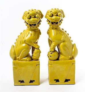 * A Pair of Chinese Glazed Ceramic Fu Dogs Height 17 inches.