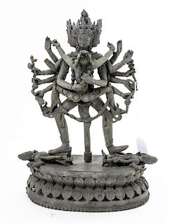 A Nepalese Cast Metal Figural Group Height 12 inches.