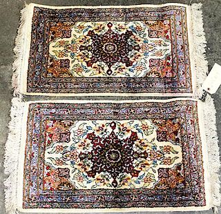 Two Wool Prayer Rugs Dimensions of largest 2 feet 4 1/2 inches x 1 foot 5 inches.