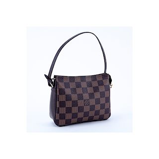 Louis Vuitton Brown Damier Ebene Coated Canvas Make-Up Pouch. Golden brass hardware, red canvas int