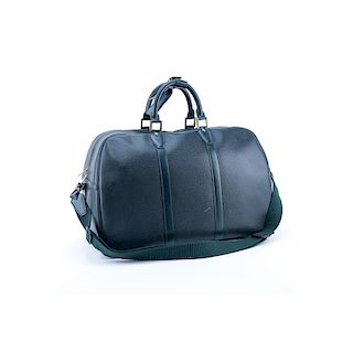 Louis Vuitton Dark Green Tiaga Leather Kendall PM Travel Bag. Golden Brass Hardware, green leather 