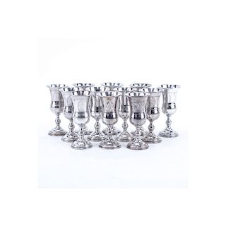 Set of Twelve (12) Sterling Silver Kiddush Cups. All appropriately stamped to base, four are stampe