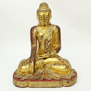 Large Burmese Gilt Painted and Glass Beaded Seated Buddha Sculpture. Typical age splits to wood, ru