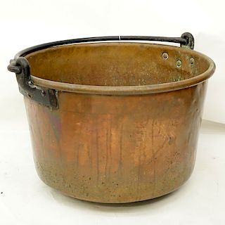 Large Antique Copper Pot. Rubbing to surface, dents, spotting and green patina. Measures 18-5/8" H 
