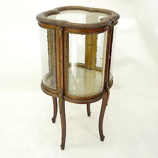 20th Century French Gilt and Floral Painted Vitrine with Brass Fittings. Two large curved fitted do