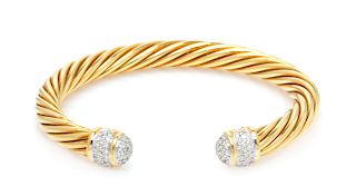 An 18 Karat Yellow Gold and Diamond 'Cable Classics' Bangle Bracelet, David Yurman, 15.30 dwts.