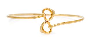 An 18 Karat Yellow Gold 'Double Open Heart' Bangle Bracelet, Elsa Peretti for Tiffany & Co., 7.10 dwts.