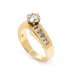 A 14 Karat Yellow Gold and Diamond Ring, 3.80 dwts.