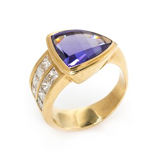 An 18 Karat Yellow Gold, Tanzanite and Diamond Ring, 6.55 dwts.