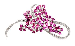 A 14 Karat White Gold, Ruby, and Diamond Brooch, 9.80 dwts.