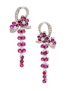 A Pair of 14 Karat White Gold, Ruby, and Diamond Earclips, 6.60 dwts.