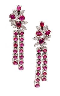 A Pair of 18 Karat White Gold, Ruby, and Diamond Convertible Day/Night Earclips, 10.10 dwts.