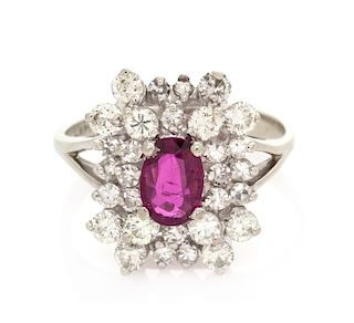 A 14 Karat White Gold, Ruby and Diamond Ring, 2.45 dwts.