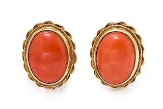 A Pair of 14 Karat Yellow Gold and Coral Earclips, 4.70 dwts.