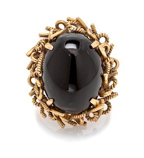 A 14 Karat Yellow Gold and Onyx Ring, 6.90 dwts.