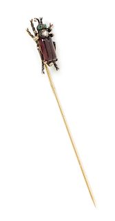 A Victorian Silver Topped Gold, Garnet, Diamond and Emerald Bug Stick Pin, 1.60 dwts.