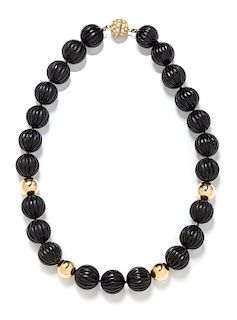 A Collection of Tiger's Eye, Onyx and Gold Bead Necklaces,