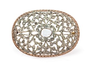An Antique Silver Topped Rose Gold and Diamond Filigree Brooch, 5.90 dwts