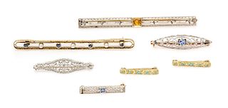 A Collection of Antique 14 Karat Gold, Gemstone and Polychrome Bar Brooches, 9.00 dwts.