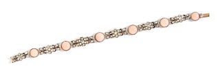 A Silver Topped Yellow Gold, Angel Skin Coral and Diamond Bracelet, 11.00 dwts.