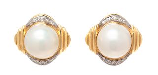 A Pair of 14 Karat Yellow Gold, Mabe Pearl and Diamond Earclips, 9.40 dwts.