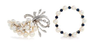 A Collection of 14 Karat White Gold, Cultured Pearl, Sapphire and Diamond Brooches, 12.20 dwts.