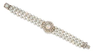 A Vintage 14 Karat White Gold, Cultured Pearl and Diamond Surprise Watch, Lucien Piccard, 21.40 dwts.