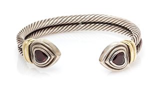 A Sterling Silver, 14 Karat Yellow Gold and Garnet 'Double Cable Heart' Cuff Bracelet, David Yurman, 30.40 dwts.
