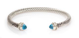 A Sterling Silver, 18 Karat Gold, Blue Topaz and Diamond 'Cable Classics' Bracelet, David Yurman, 17.90 dwts.
