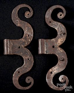Pair of wrought iron ram's horn hinges