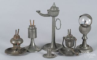 Six pewter oil lamps