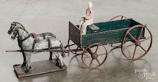 Carved and painted horse and wagon