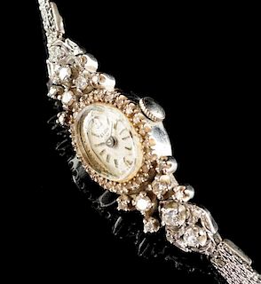 A VINTAGE 14K WHITE GOLD AND DIAMOND LADY'S ELGIN WATCH,