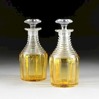 A PAIR OF BOHEMIAN FLASHED AMBER CUT CRYSTAL DECANTERS, CZECHOSLOVAKIA, CIRCA 1850,