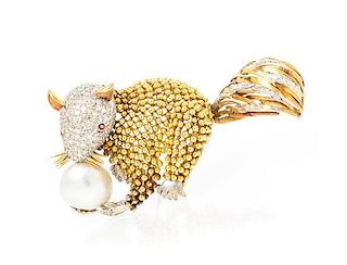 * An 18 Karat Gold, Diamond, Ruby and Pearl Squirrel Brooch, 22.40 dwts.
