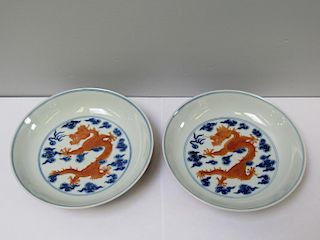 Pair of Iron Red and Blue Dragon Dishes.