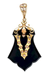 A Victorian 18 Karat Yellow Gold, Onyx and Diamond Mourning Pendant, 10.80 dwts.