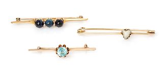 A Collection of Antique Gold and Gemstone Bar Brooches, 7.60 dwts.