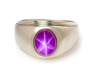 A 14 Karat White Gold and Star Ruby Ring, 7.90 dwts.