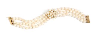 A 14 Karat Yellow Gold and Cultured Pearl Surprise Watch, GENEVA,