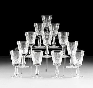 A SET OF TWELVE WATERFORD CUT CRYSTAL CLARET WINE GLASSES IN THE "KENMARE" PATTERN, IRELAND, DESIGNED CIRCA 1968,