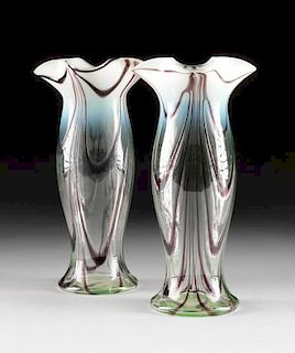 A PAIR OF CLEAR TO OPALESCENT GLASS VASES WITH PURPLE TRAILED DECORATION, PROBABLY CONTINENTAL, CIRCA 1900,