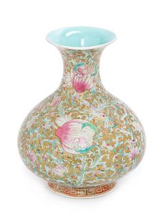 A Chinese Gilt Decorated Famille Rose Porcelain Vase Height 7 1/4 inches.