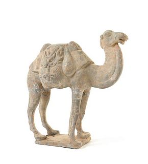 * A Chinese Grey Pottery Figure of a Camel Height 12 inches.