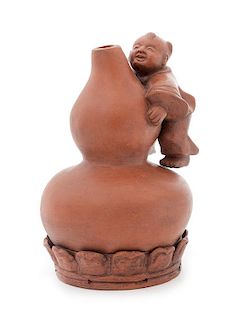 A Chinese Yixing Pottery Gourd Vase Height 8 1/4 inches.